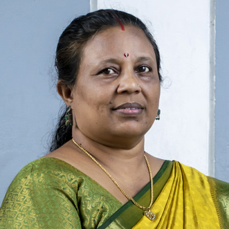 Nisha T